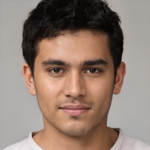 Neutral latino young-adult male with short  black hair and brown eyes