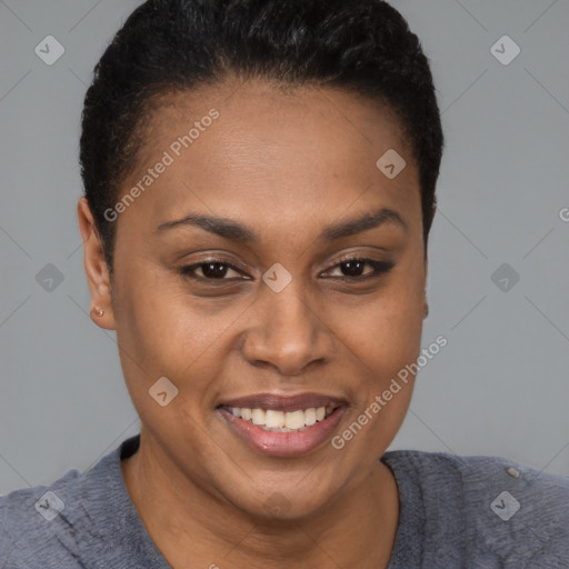 Joyful black young-adult female with short  brown hair and brown eyes