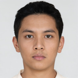 Neutral asian young-adult male with short  brown hair and brown eyes