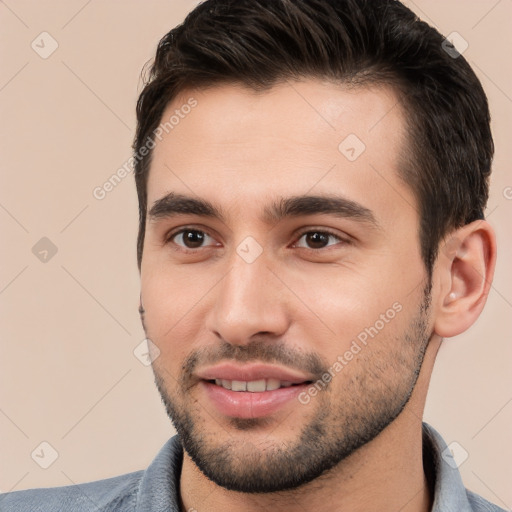 Joyful white young-adult male with short  brown hair and brown eyes