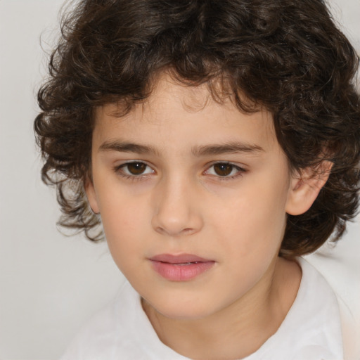 Joyful white child female with medium  brown hair and brown eyes