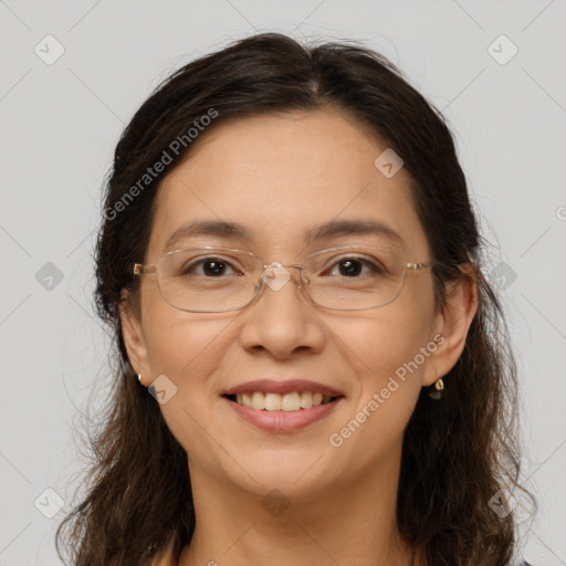 Joyful white adult female with long  brown hair and brown eyes