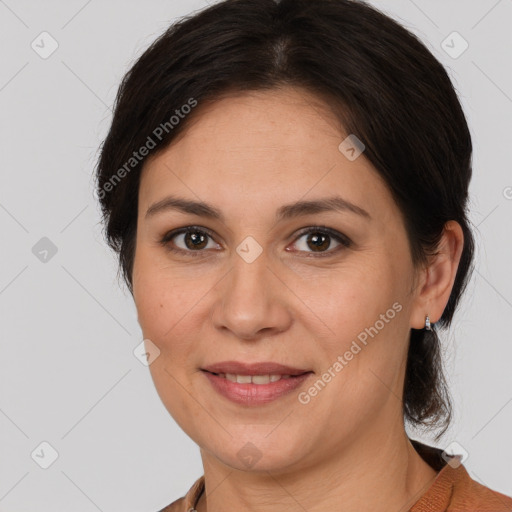 Joyful white adult female with medium  brown hair and brown eyes