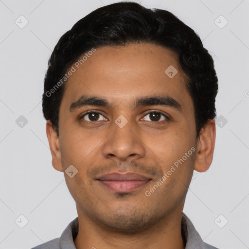 Joyful latino young-adult male with short  black hair and brown eyes