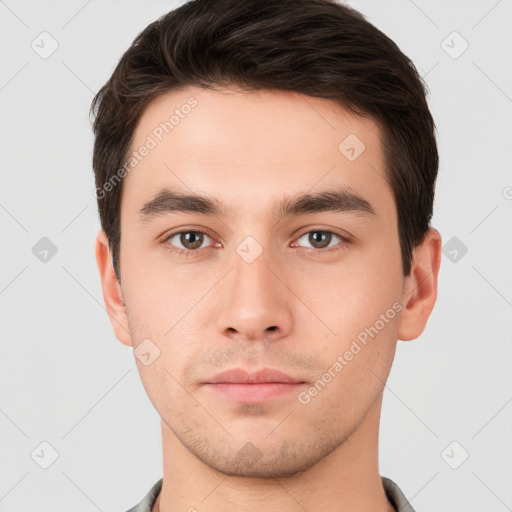 Neutral white young-adult male with short  brown hair and brown eyes