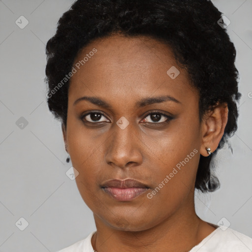 Neutral black young-adult female with short  brown hair and brown eyes