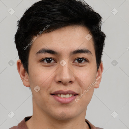 Joyful latino young-adult male with short  brown hair and brown eyes