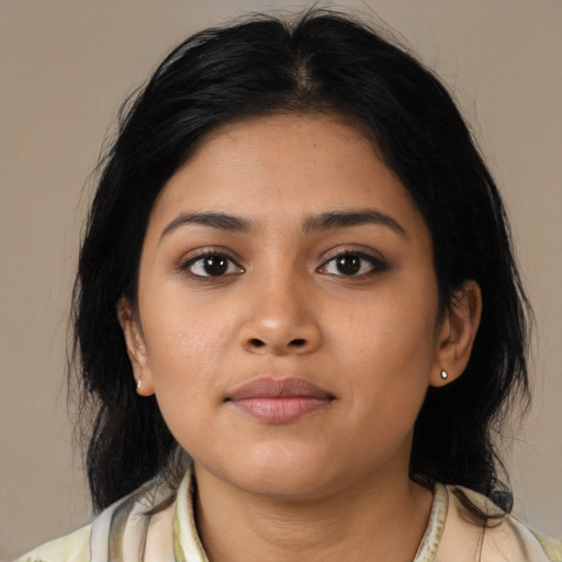 Neutral latino young-adult female with medium  black hair and brown eyes