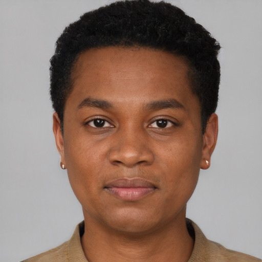 Joyful black young-adult male with short  black hair and brown eyes