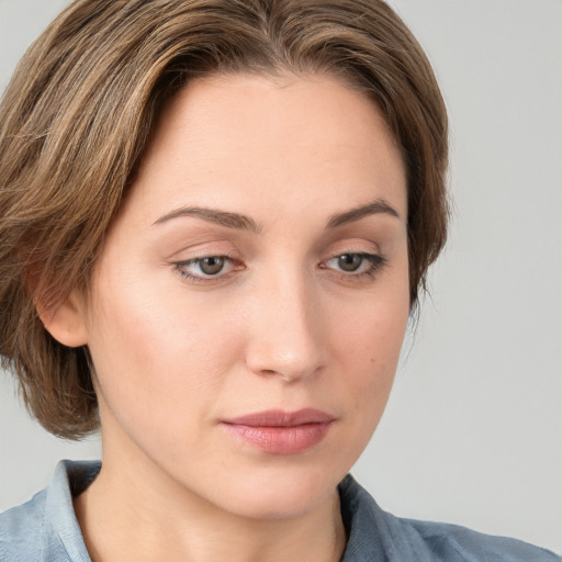 Neutral white young-adult female with medium  brown hair and blue eyes