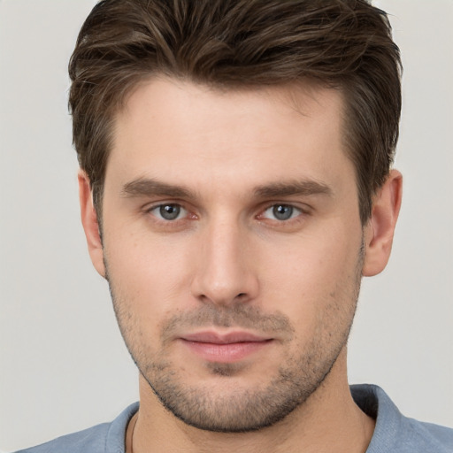 Neutral white young-adult male with short  brown hair and brown eyes