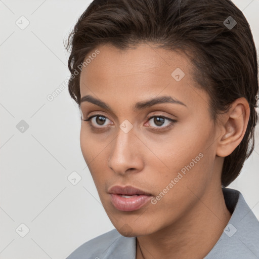 Neutral white young-adult female with short  brown hair and brown eyes