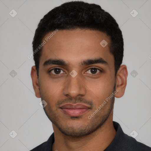 Joyful latino young-adult male with short  black hair and brown eyes