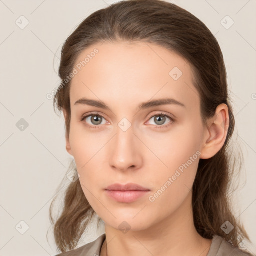 Neutral white young-adult female with medium  brown hair and brown eyes