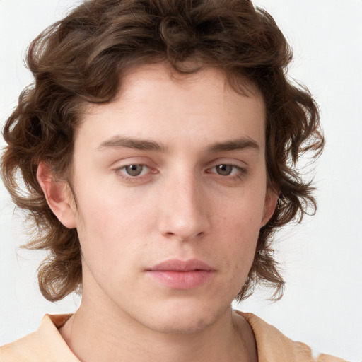 Neutral white young-adult male with medium  brown hair and brown eyes