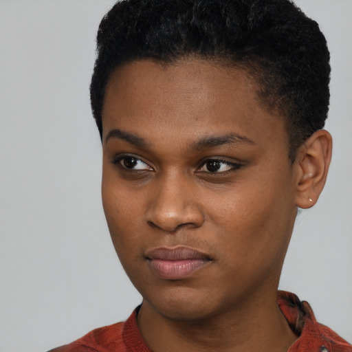 Neutral black young-adult female with short  black hair and brown eyes