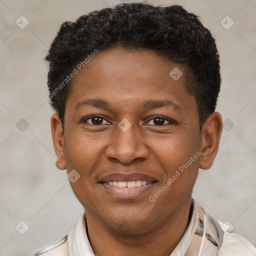 Joyful latino adult male with short  brown hair and brown eyes