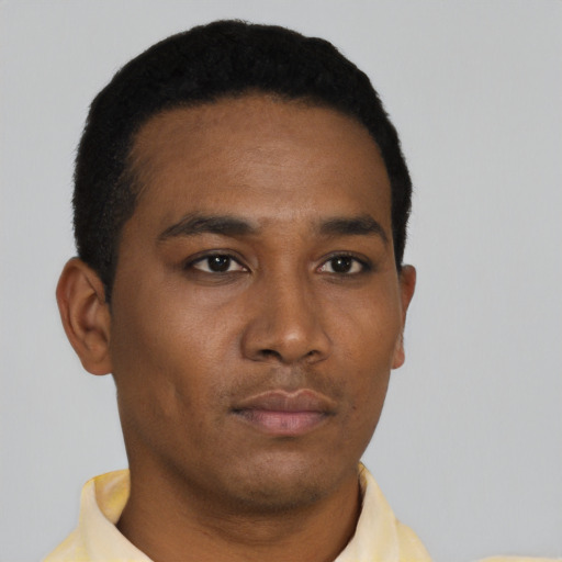 Neutral black young-adult male with short  black hair and brown eyes