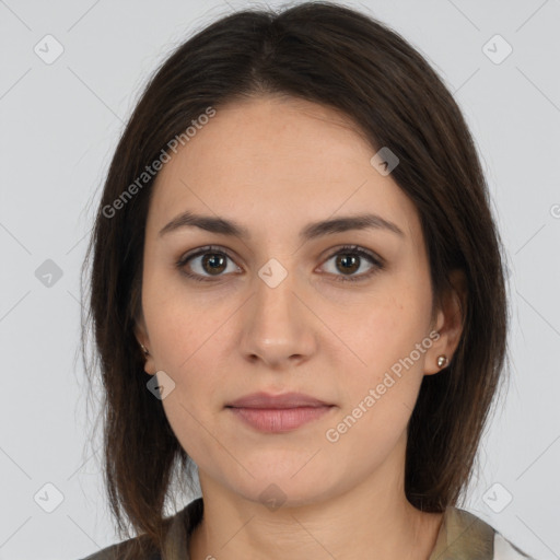 Neutral white young-adult female with medium  brown hair and brown eyes