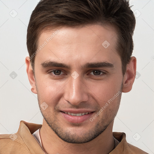 Joyful white young-adult male with short  brown hair and brown eyes