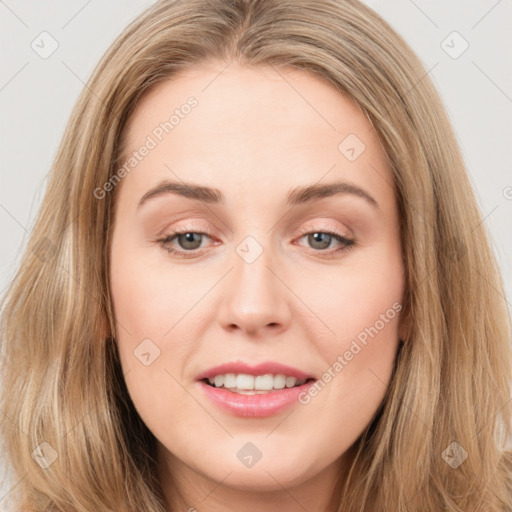 Joyful white young-adult female with long  brown hair and brown eyes