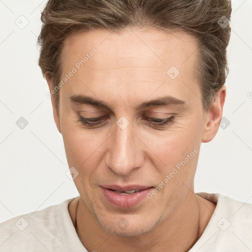 Joyful white adult female with short  brown hair and brown eyes