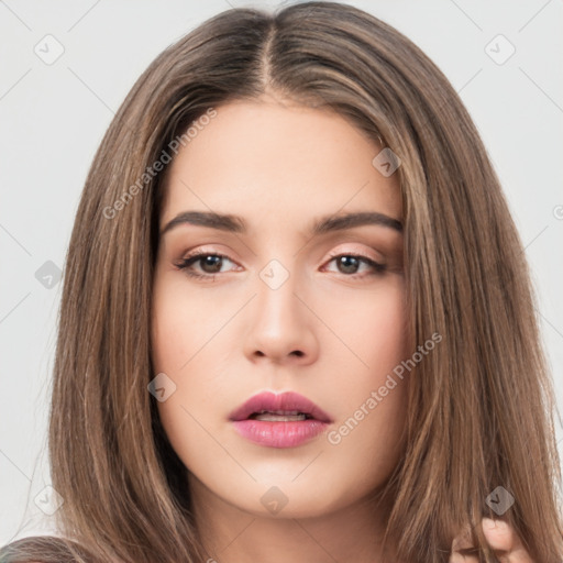 Neutral white young-adult female with long  brown hair and brown eyes