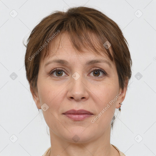 Joyful white adult female with medium  brown hair and grey eyes