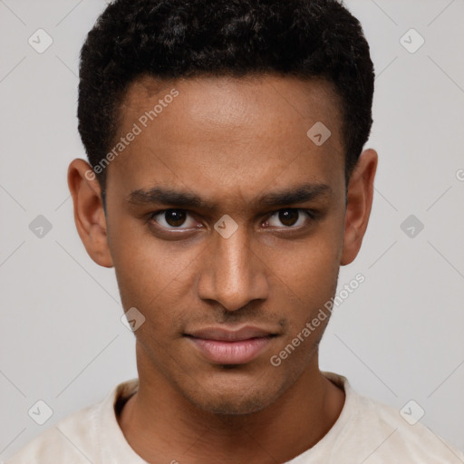 Joyful latino young-adult male with short  brown hair and brown eyes