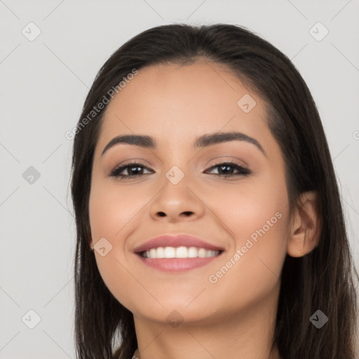 Joyful latino young-adult female with long  black hair and brown eyes