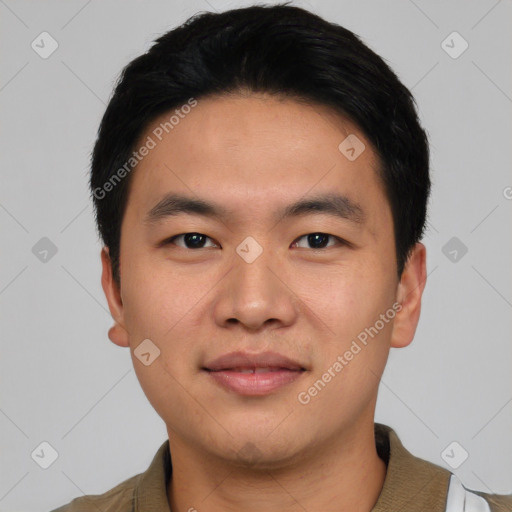 Joyful asian young-adult male with short  black hair and brown eyes