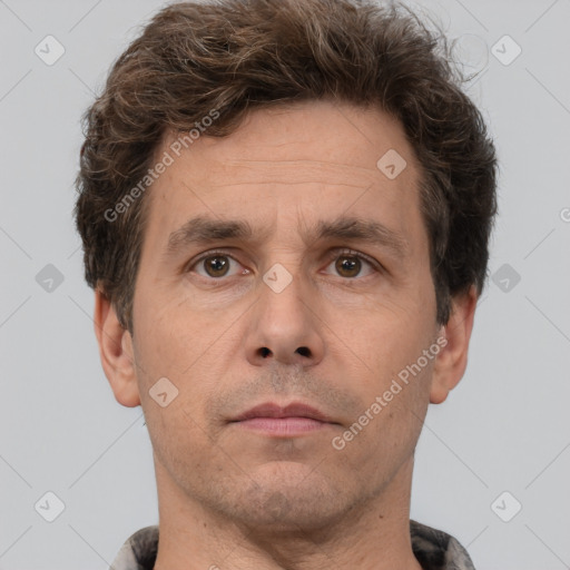 Neutral white adult male with short  brown hair and brown eyes