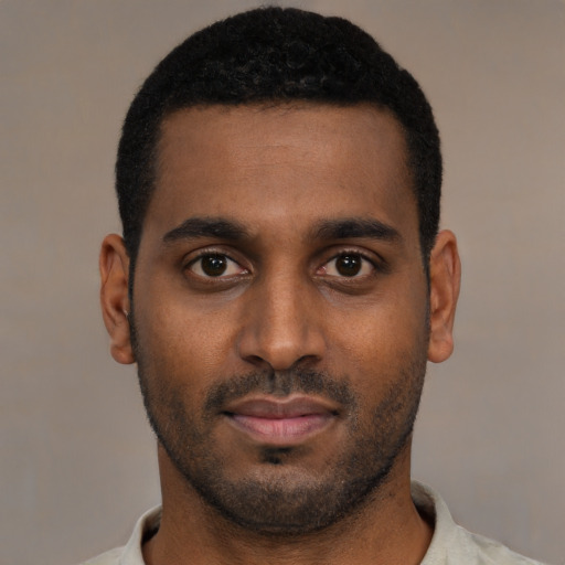 Neutral black young-adult male with short  black hair and brown eyes