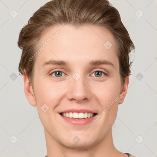 Joyful white young-adult female with short  brown hair and grey eyes