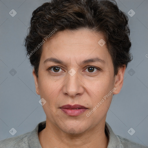 Joyful white adult female with short  brown hair and brown eyes