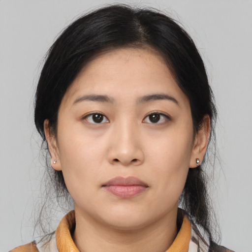 Neutral asian young-adult female with medium  black hair and brown eyes
