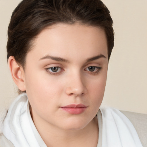 Neutral white young-adult female with short  brown hair and brown eyes