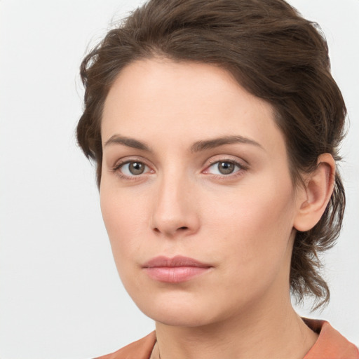 Neutral white young-adult female with medium  brown hair and brown eyes