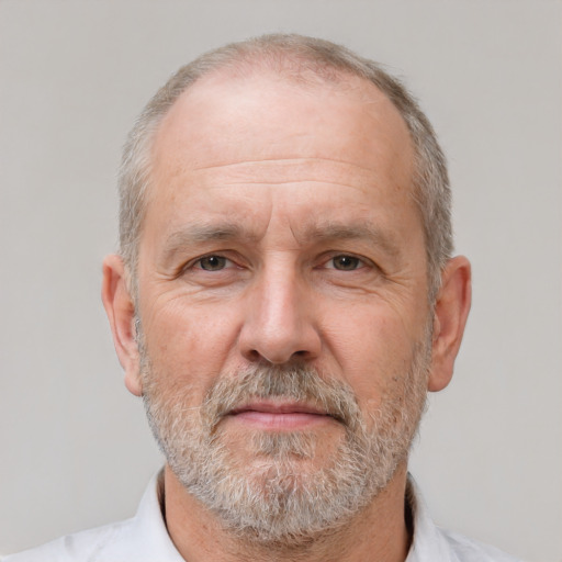 Neutral white middle-aged male with short  gray hair and brown eyes