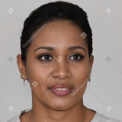 Joyful black young-adult female with short  brown hair and brown eyes