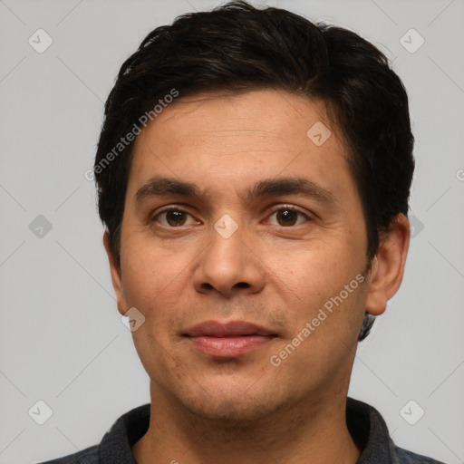 Joyful white adult male with short  brown hair and brown eyes