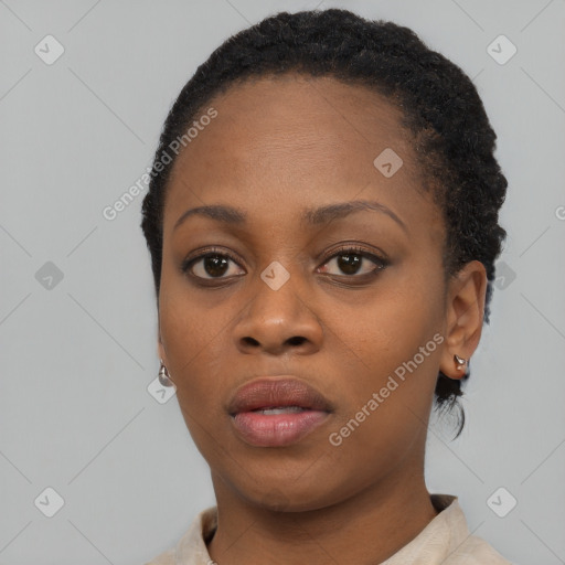 Neutral black young-adult female with short  black hair and brown eyes