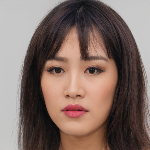 Neutral asian young-adult female with long  brown hair and brown eyes