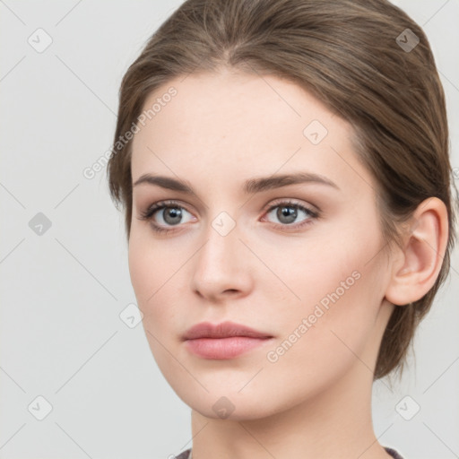 Neutral white young-adult female with medium  brown hair and grey eyes