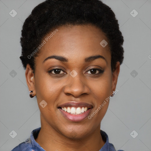 Joyful black young-adult female with short  black hair and brown eyes