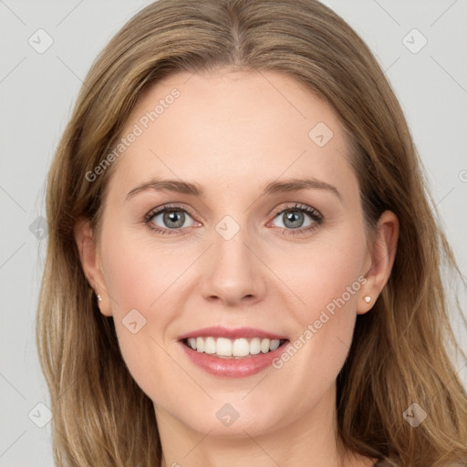 Joyful white young-adult female with long  brown hair and grey eyes