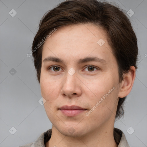 Joyful white young-adult female with short  brown hair and brown eyes