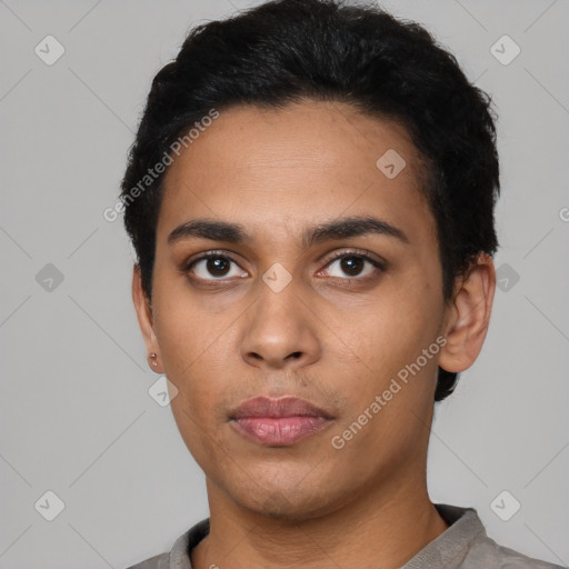 Neutral latino young-adult male with short  black hair and brown eyes