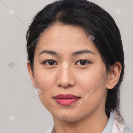 Joyful asian young-adult female with short  brown hair and brown eyes