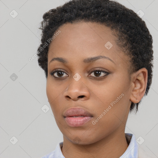 Neutral black young-adult female with short  brown hair and brown eyes